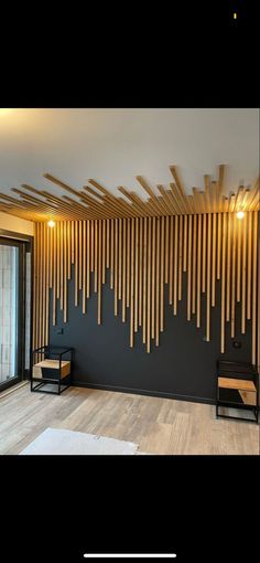 an empty room with wood slats on the wall