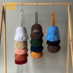 Personalized Cap Rack, Hat Storage, Gift For Father, Home Organization, Closet Organizer, Baseball Hat Hanger, Wall Mount Cap Rack 💖 Welcome to Tuny Studio! ☘ Looking for a stylish and practical way to store your baseball caps? Look no further than our Macrame Cap Rack! This fun home decor piece is perfect for any baseball-themed room or boho-inspired space. With its vertical design and snapback cap display, it's also a great gift for him, especially for Father's Day or as a baseball coach gift. This macrame hanger doubles as an entryway organizer and farmhouse decor piece, making it the perfect addition to any home. ☘ This Macrame Hat Hanger is handcrafted/ hand woven with Natural Friendly Cotton Cord and High Quality Plywood. ☘ DETAIL: - Length (without hat): + 3 hats: 22 inches ~ 55cm Hat Organization Diy, Baseball Hat Hanger, Diy Hat Holder, Home Organization Closet, Baseball Theme Room, Cap Rack, Baseball Coach Gifts, Organization Closet, Cap Display