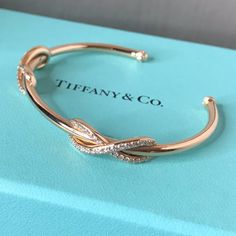 Tiffany & Co. Infinity Double Cuff -18k Rose Gold With Round Brilliant Diamonds -Medium, Fits Wrists Up To 6.25" -Carat Total Weight .65 -Comes With Original Tiffany Box And Black Felt Box -Brand New Condition. -No Receipt, As It Was A Gift From Years Ago. Jewelry Tiffany And Co, Tiffany And Co Jewelry Tiffany & Co., Elegant Jewelry Tiffany & Co., Tiffany & Co, Tiffany Lock Bracelet, Jewelry Bracelets Gold Tiffany & Co., Gold Bracelet Cuff Tiffany & Co., Tiffany Lock Bangle, Tiffany Box