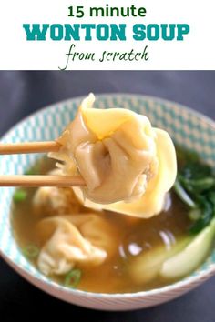 a bowl filled with soup and chopsticks in it