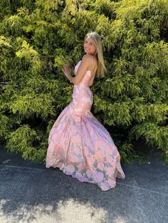 This exquisite floral organza jacquard gown provides a modernized look that will dazzle the onlookers. Featuring a form fitting mermaid silhouette with sweep train and a unique exposed back zipper detail, Rachel Allan 7087 Pink is sure to turn heads. Fishtail Gown With Fitted Bodice For Homecoming, Fitted Organza Gown For Homecoming, Prom Season Mermaid Silhouette Gown With Fitted Bodice, Mermaid Silhouette Gown For Prom Season, Spring Wedding Mermaid Dress With Fitted Bodice, Spring Prom Mermaid Dress With Mermaid Hem, Fitted Floral Print Prom Gown, Fitted Floral Print Gown For Prom Season, Fitted Floral Print Gown For Prom