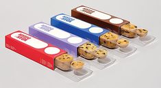 four boxes with different types of cookies in them