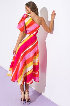 A printed woven midi dress featuring one shoulder neckline, bow at shoulder, A line skirt and side zipper closureDetails:Self : 100% PolyesterLining : 100% PolyesterSize & Fit- Model is 5`8" And Wearing Size Small- Measurements Taken From Size Small- Approx. Length: 48" One Shoulder Neckline, Line Skirt, Orange Pink, A Line Skirt, A Line Skirts, Side Zipper, Pink And Orange, Fitness Models, One Shoulder