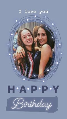 two girls are hugging each other in front of a happy birthday card