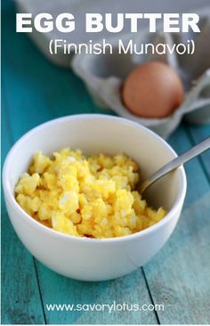 egg butter in a white bowl next to an egg on a blue wooden table with text overlay