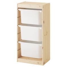 a wooden shelf with two white bins on top and one is open to show the bottom