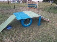 an upside down table in the middle of a yard