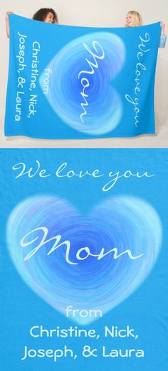 two people laying in bed under a blue blanket that says, we love you mom