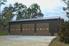 two garages are shown in front of some trees