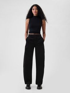 Soft corduroy tapered trousers.  Concealed hook and bar closure, zip fly.  Front slant pockets, back welt pockets.  Fit: Classic.  An easy silhouette that fits close at the waist, and is relaxed through the hips and thigh.  High rise.  Tapered leg.  Models wearing Gap Tapered Dress Pants Outfit, Cute Office Clothes, Dressy Streetwear Fashion, Petite Pants For Women, Black Clothes Outfits, Thesis Defense Outfit, Black Corduroy Pants Outfit, Alternative Office Fashion, Cool Business Casual