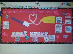 a bulletin board with toothbrushes and dental floss on it that says show your teeth some love