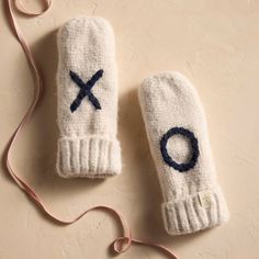 Treat someone you love to the cozy warmth of these flip-top mittens, perfect for bundling up on winter strolls. Each pair is lined with plush fleece and finished with ‘XO’ details. Cold Weather Travel, Winter Travel Outfit, Trip Outfits, Knit Mittens, Winter Travel, Winter Accessories, Fashion Essentials, Mitten Gloves, Travel Essentials