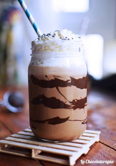 there is a drink with whipped cream and chocolate