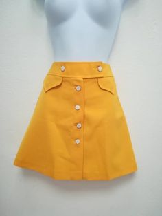 JO SKIRT Handmade skirt 100% Polyester Color: yellow You can choose your own measurements, color or length. You can choose lining, or other special request. Special request are easy, just add this listing to your cart https://www.etsy.com/listing/624364219/special-requests?ref=shop_home_active_25 If you want it on a rush you have priority shipping here, just add the one suits you the best to your cart https://www.etsy.com/shop/swingingchicksshop/items?ref=pagination&section_id=24952619 If yo 1960s Mini Skirt, 60s Skirt, Retro Skirt, Handmade Skirts, Yellow Skirt, 1960s Fashion, 60s Fashion, Suits You, Aesthetic Clothes