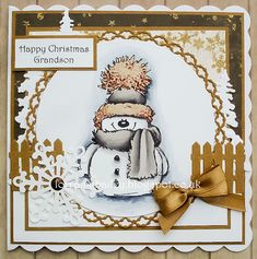 a handmade christmas card with a snowman wearing a knitted hat and scarf