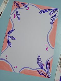 a piece of paper with purple leaves on it