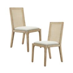 two wooden chairs with white upholstered cushions