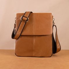 Leather Messenger Bags Crossbody for Men Shoulder Bags Retro Vertical Small Satchel Leather Leather gift for him Anniversary gift Father's Day --ABOUT PRODUCT-- SIZE: 25x21x2cm/9.8x8.3x0.8in --Item Weight: 0.475Kg/1.0Pounds The strap length is 135cm. Bottom zipper unzipped crossbody bag unfolded thickness: 5CM The dimensions are measured manually, and there may be errors. ★Handcrafted from premium leather, this small leather man bag is rugged and long lasting. ★This leather man bag is constructed from only the top layer of the cowhide, giving it extra strength, breathability and durability. ★Designed to be a companion for life, this lmen's bag will only get better with age. Precisely handcrafted by expert artisans, this mens leather man bag is made with only premium brass and metal hardwar Versatile Business Satchel With Mobile Phone Bag, Portable Leather Tote Shoulder Bag, Modern Portable Brown Bag, Business Satchel Shoulder Bag With Mobile Phone Pocket, Business Crossbody Mobile Phone Pouch, Leather Tote Satchel, Rectangular Saddle Bag With Mobile Phone Pocket For Travel, Rectangular Saddle Bag For Travel With Phone Bag, Rectangular Brown Camera Bag With Phone Holder