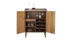 a wooden cabinet with wine glasses on it