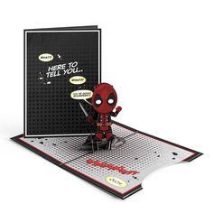 a pop up deadpool is standing in front of a sign that says here to tell you