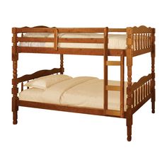 a wooden bunk bed with two mattresses on the bottom and one in the middle