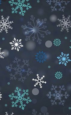 snowflakes on a black background with blue and white dots