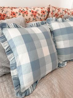 four pillows are stacked on top of each other