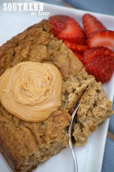 a close up of a plate of food with strawberries and oatmeal