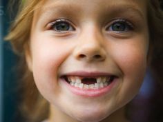 an image of a child's smile on the first grade page of this website