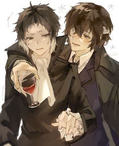 two people holding wine glasses in their hands