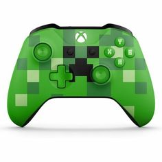 a green controller with black buttons on the front and side, which is designed to look like