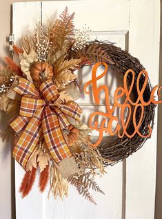 a wreath with the word hello fall on it