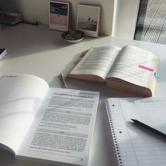 an open book sitting on top of a table