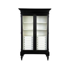 an empty black and white cabinet with drawers