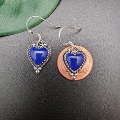 Visit our on-line shop at: Etsy.com/shop/AlbuquerqueDesigns *sterling silver earrings *dangles / drops / ear wires / hooks *southwestern jewelry *blue lapis lazuli *calibrated pre-cut stones: 10x10mm heart shape *back of jewelry items are all covered / do not show the back of stones *all jewelry items are made to ship, slight variations in stones will occur comparing to pictures. *size of a penny is 19mm or a dime is 18mm in diameter for comparing size with jewelry items. *handcrafted in USA *fr Sterling Silver Heart Beads Dangle Earrings, Sterling Silver Heart-shaped Earrings With Heart Beads, Sterling Silver Heart Earrings With Heart Beads, Valentine's Day Blue Heart Earrings, Blue Earrings For Anniversary On Valentine's Day, Blue Heart Earrings For Gift, Blue Heart Charm Earrings For Valentine's Day, Blue Heart Cut Earrings For Valentine's Day, Blue Elegant Heart Earrings For Pierced Ears