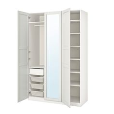 an open white closet with shelves and drawers