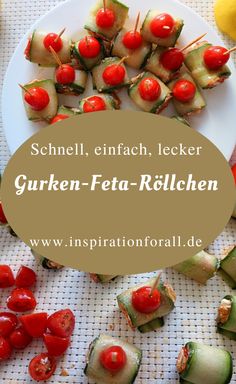 there are cucumber and cherry tomatoes on skewers with the words grilled - feta - krillchen