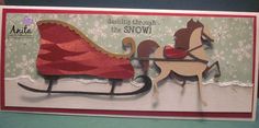 a handmade christmas card with a sleigh being pulled by a horse and carriage