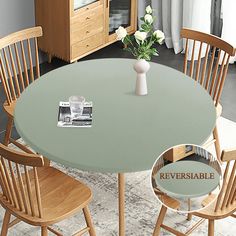 a round table with four chairs around it