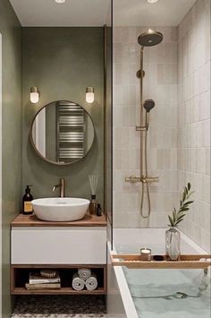 a bathroom with a sink, mirror and bathtub in the middle of the room