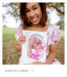 a woman holding up a book in front of her face with the title shop my e - book