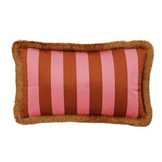 a pink and brown striped pillow on a white background