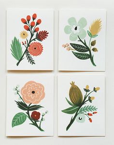 four cards with flowers on them are arranged in the shape of squares, each featuring different leaves and flowers