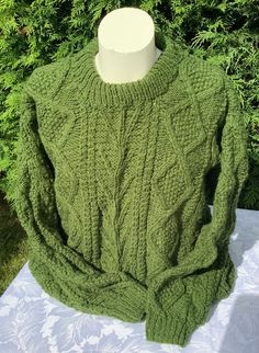 Hand knit jumper in green  Hand knit jumper in machine washable 80% Acrylic 20% wool mix  Measurements  Chest 44 inches  Length 30 inches  Sleeve 24 inches Fitted Hand Knitted Green Sweater, Green Fine Knit Winter Sweater, Fitted Green Hand-knitted Sweater, Green Wool Textured Knit Sweater, Green Textured Wool Sweater, Hand Knitted Jumpers, Pullover Sweaters, Sweater Outfits, Hand Knitting