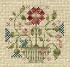 a cross stitch pattern with flowers and birds in the vase on white background, which is also available as a wall hanging