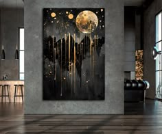 a black and gold painting in a living room