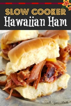 two pulled pork sandwiches on a plate with text overlay that reads slow cooker hawaiian tan