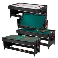 three black tables with green cloths and red flowers on them, one has a pool table in the middle