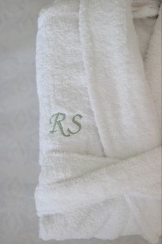 a white towel with the letter r s on it