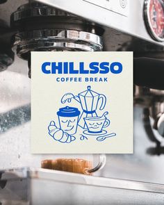 a sign that reads chillsso coffee break next to a coffee pot and espresso machine